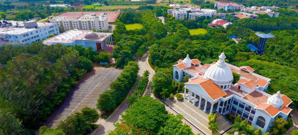 Alliance School of Business Bengaluru green campus with modern academic buildings and lush landscaping